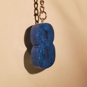 Deep blue shiny number 8 resin keychain